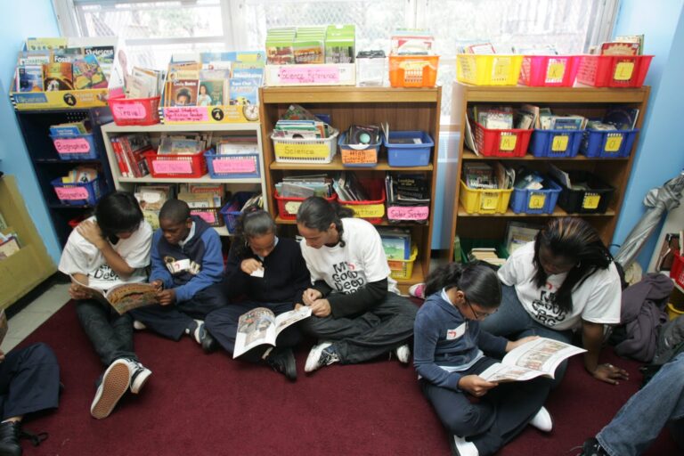 Reading with school children at a 9:11 Day or Service Event